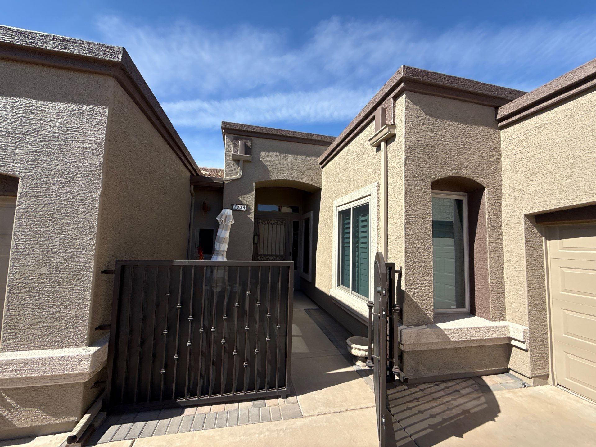 Finished courtyard entry on a repainted Gilbert home