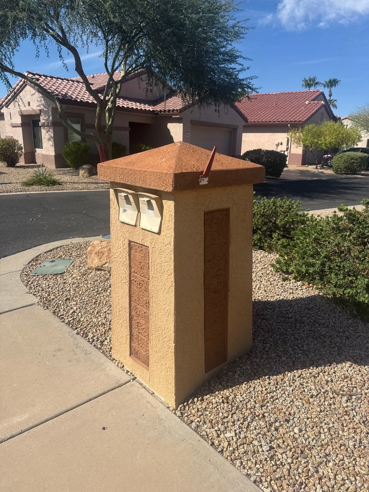 Surprise mailbox pillar before repainting