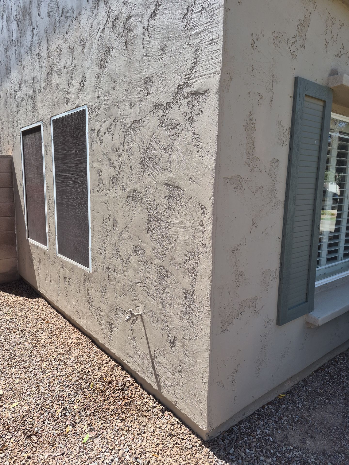 Finished stucco repair and repaint on a Peoria side wall