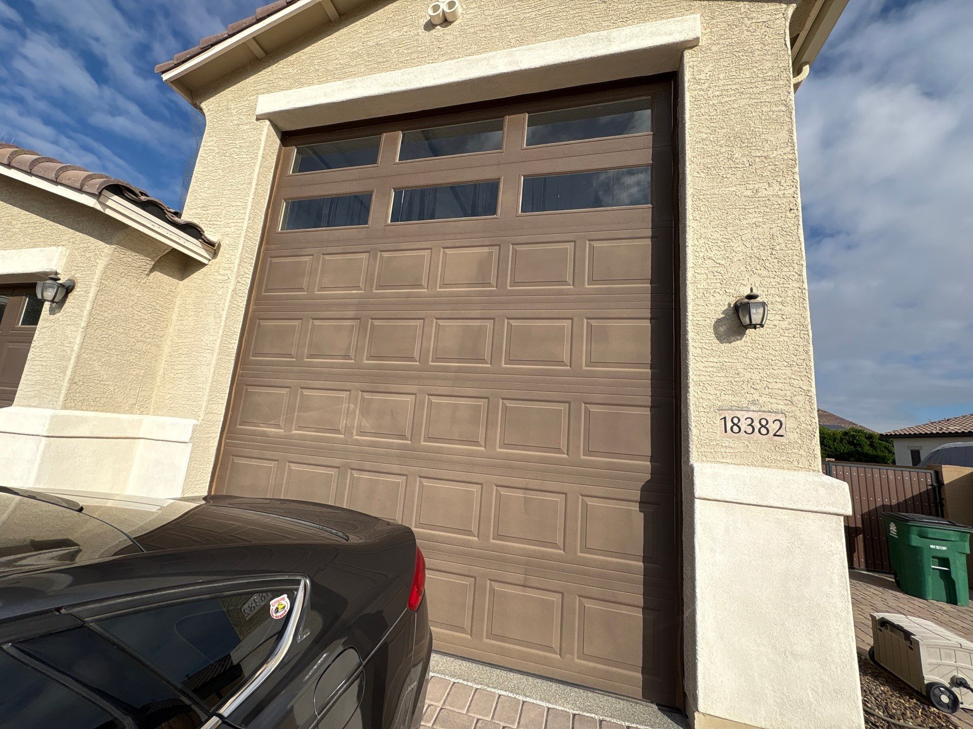 Finished garage door and trim detail on a Goodyear home