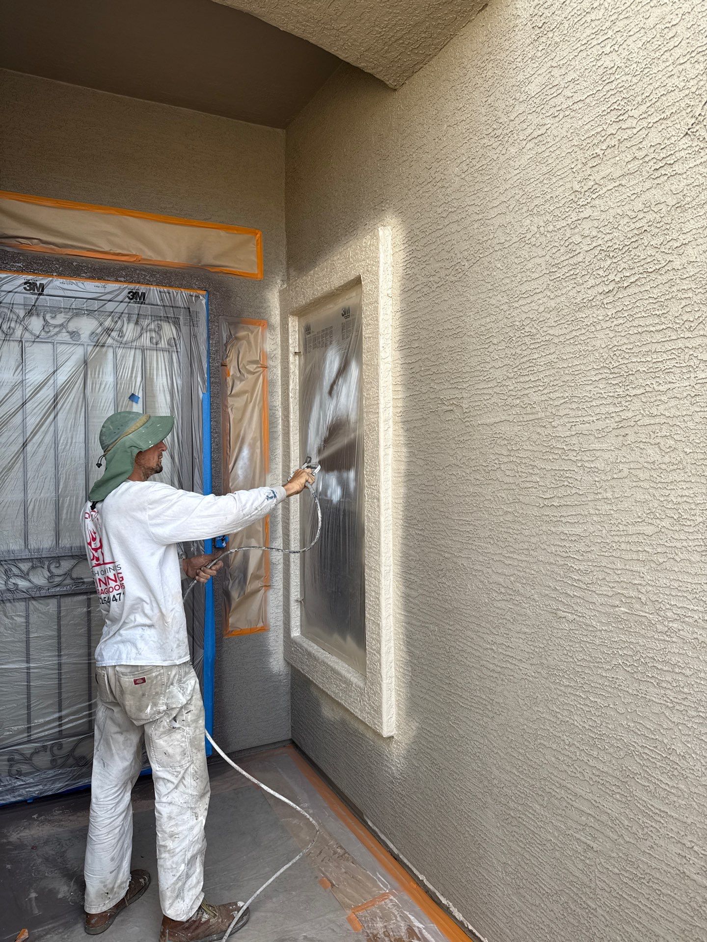 Crash of Rhinos painter spraying a masked entry at a Gilbert home