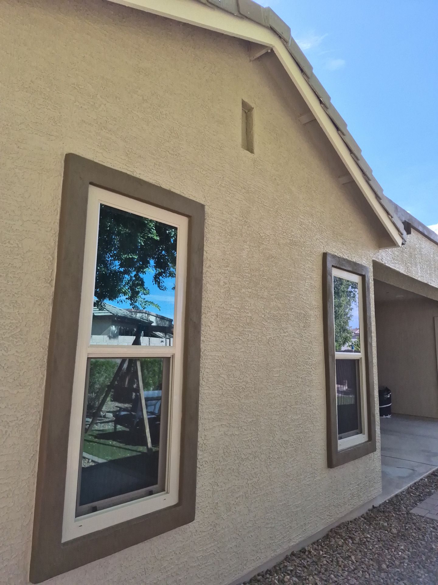 Finished side elevation and window trim on a Chandler home
