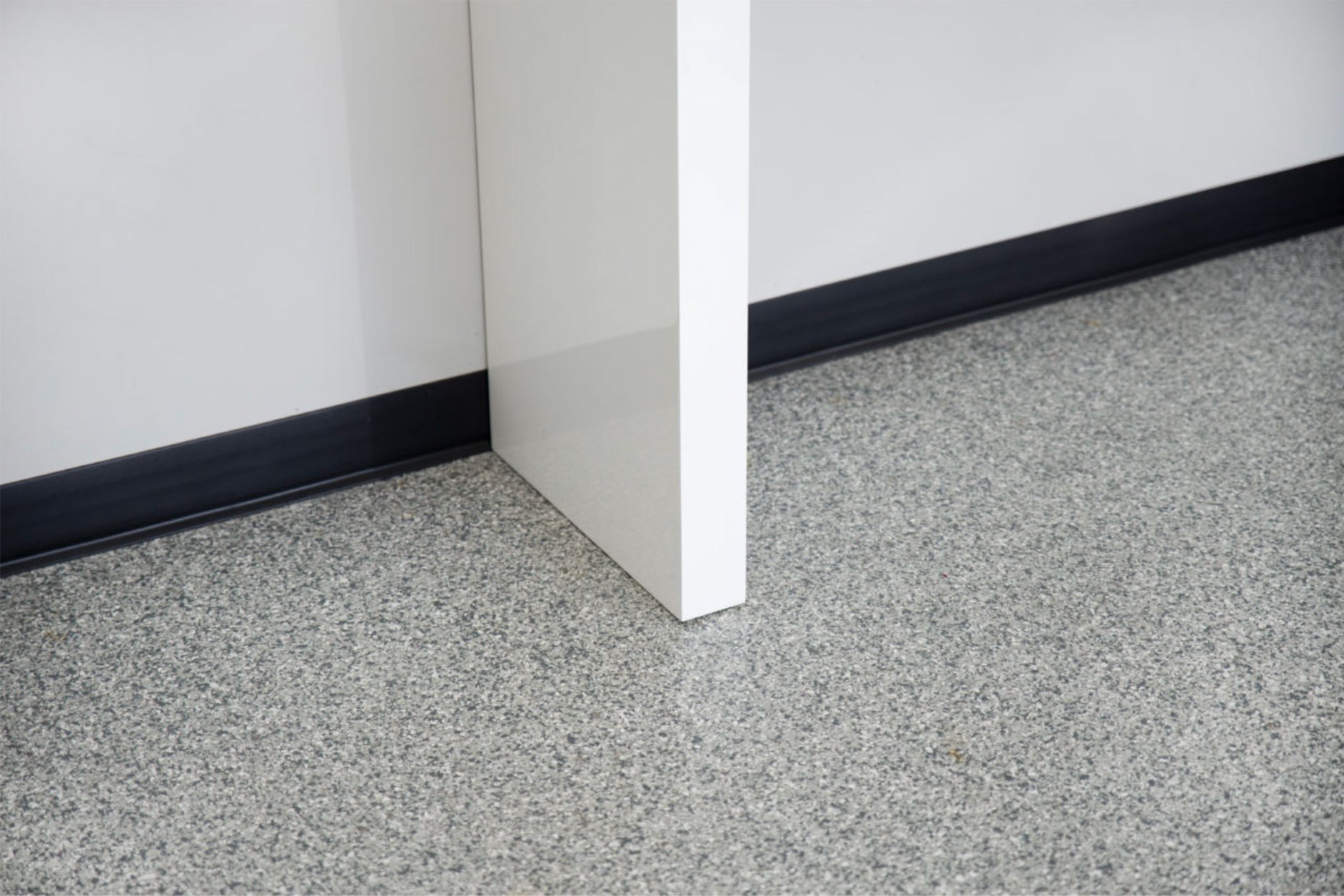 Gravel (FB-414) flake garage floor installed in a home garage