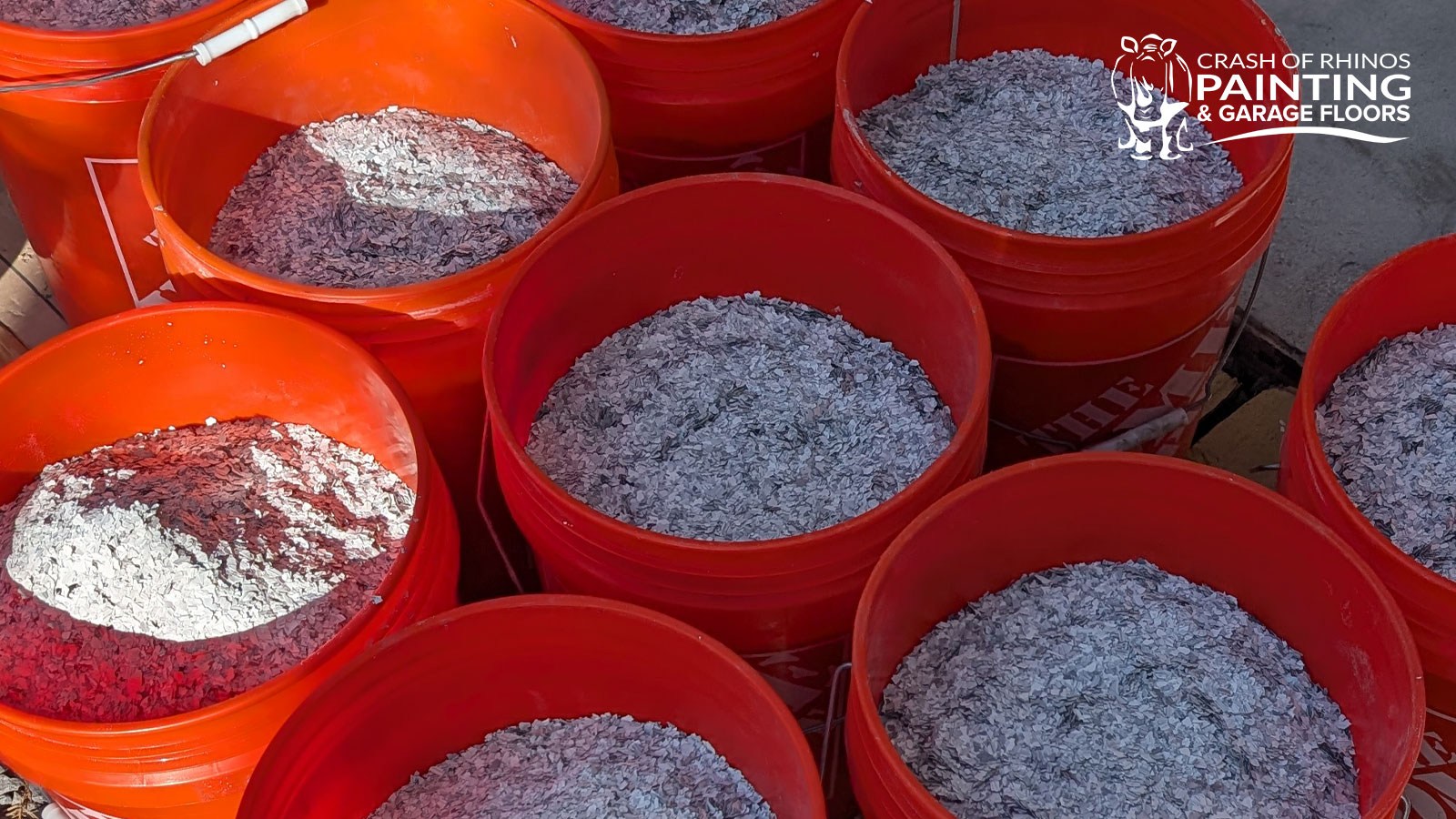 Schist (F9307) polymer flake chips in a loose pile
