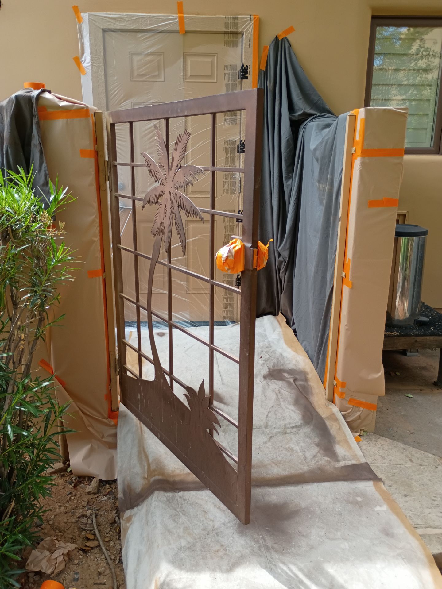 Doors removed and masked off during a East Valley exterior repaint