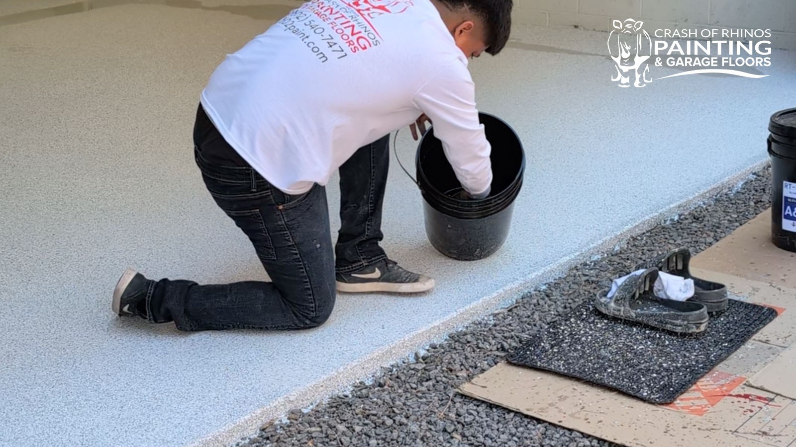 Schist (F9307) flake being broadcast during a garage floor installation
