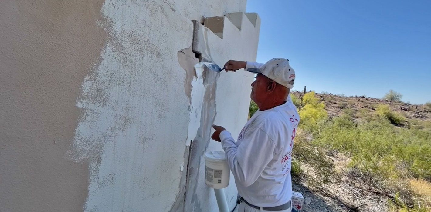 filling-a-crack-on-a-retaining-wall