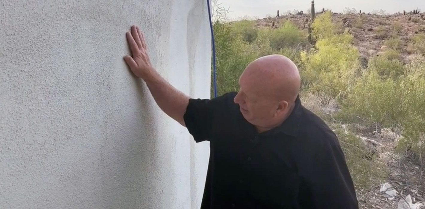 Stucco patch with top coat applied during exterior prep work in Phoenix, AZ