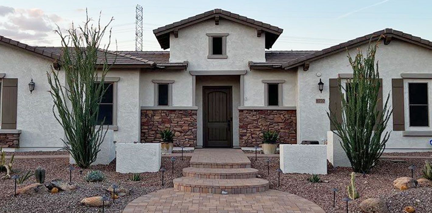 Light-colored exterior repaint on a Peoria, Arizona home — Crash of Rhinos Painting