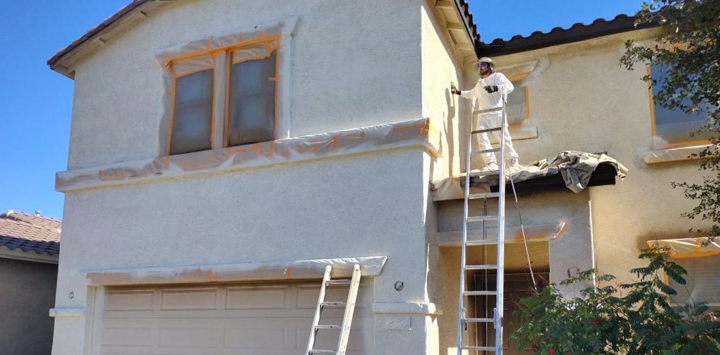 Painting stucco on a second story